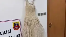Gelinliğin üzerine boncuk şeklinde işlenmiş uyuşturucu ele geçirildi