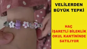 Okul kantininde satılan haç işaretli bileklik