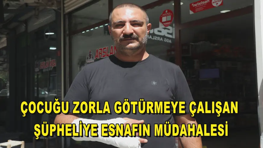 Çocuğu zorla götürmeye çalışan şüpheliye esnafın müdahalesi