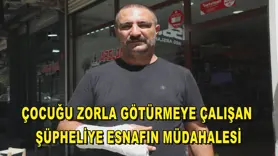 Çocuğu zorla götürmeye çalışan şüpheliye esnafın müdahalesi
