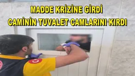 Madde krizine girdi caminin tuvalet camlarını kırdı
