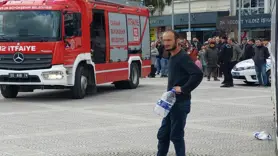 Meydanda kendini yakmak istedi