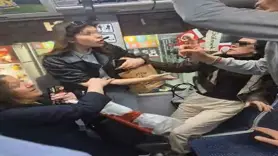 Tramvayda yolcuların koltuk kavgası